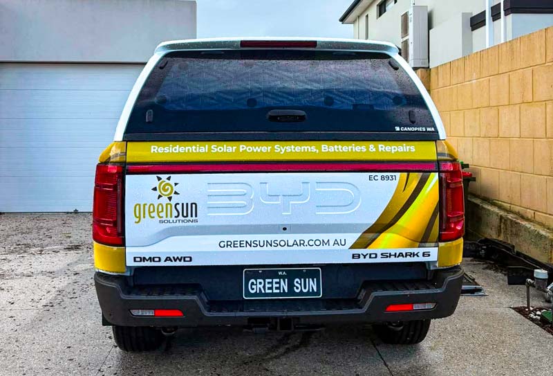 Green Sun Solutions BYD electric ute with company signage