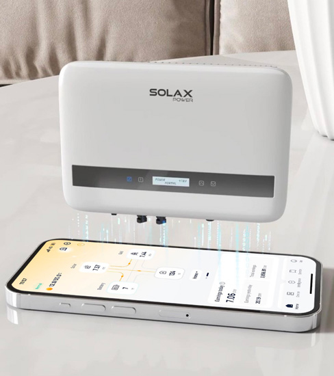 SolarX battery hardware and monitoring app on a smartphone